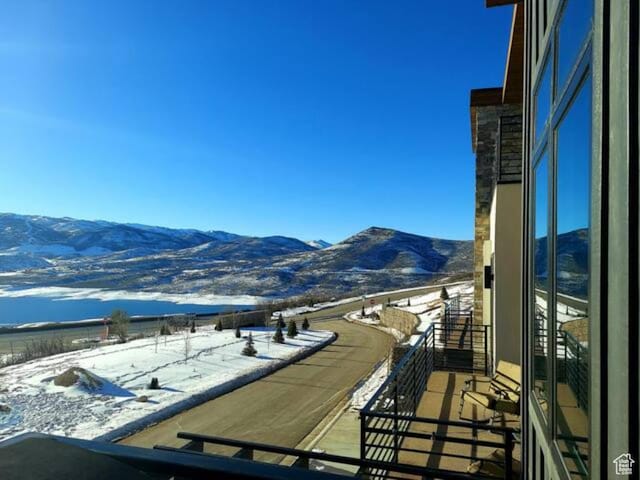 801 E Klaim Dr N, Hideout, UT 84036 - snow covered back of property featuring a mountain view