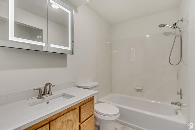 full bathroom with tile patterned flooring, toilet, vanity, and bathing tub / shower combination