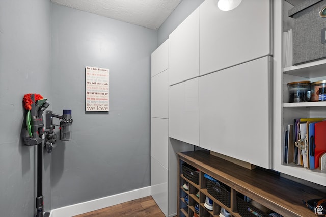 322 Flour Mill Dr, Kaysville, UT 84037 - details with baseboards, wood finished floors, and a textured ceiling