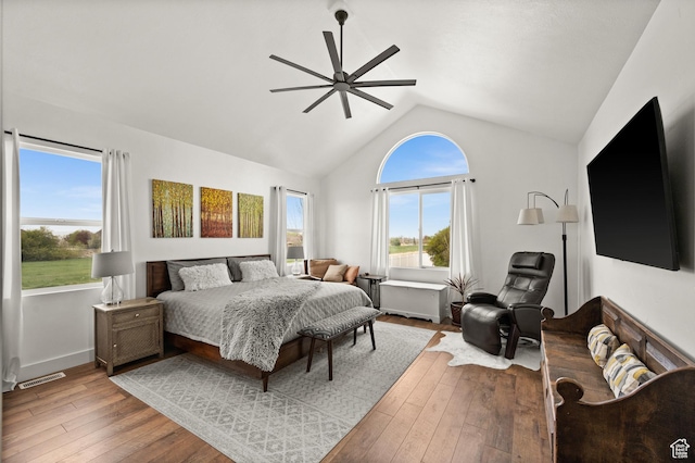 322 Flour Mill Dr, Kaysville, UT 84037 - bedroom with hardwood / wood-style flooring, lofted ceiling, multiple windows, and visible vents