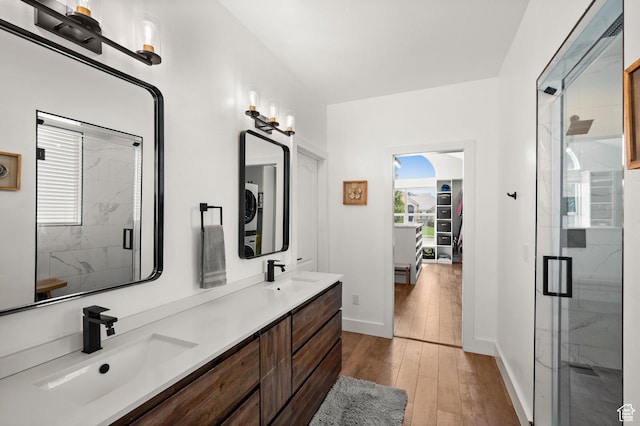 322 Flour Mill Dr, Kaysville, UT 84037 - full bath with hardwood / wood-style flooring, a sink, and a marble finish shower