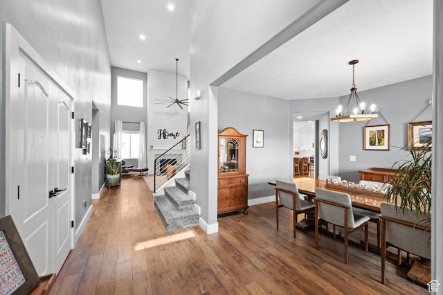 322 Flour Mill Dr, Kaysville, UT 84037 - entryway with stairway, hardwood / wood-style floors, ceiling fan with notable chandelier, a towering ceiling, and recessed lighting