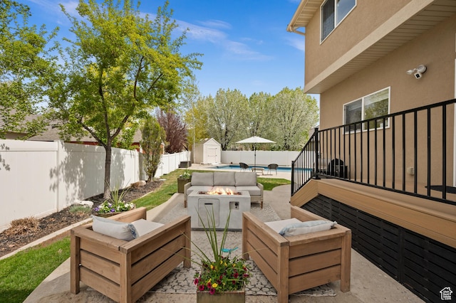 322 Flour Mill Dr, Kaysville, UT 84037 - view of patio with a fenced backyard, an outdoor living space with a fire pit, a fenced in pool, and a storage shed