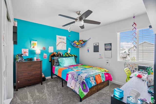 13137 S Acklins Dr, Herriman, UT 84096 - carpeted bedroom with ceiling fan and baseboards