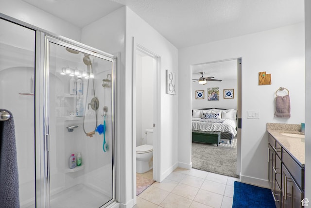 13137 S Acklins Dr, Herriman, UT 84096 - ensuite bathroom with a ceiling fan, vanity, connected bathroom, and a stall shower