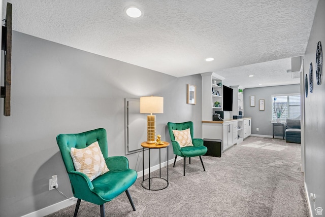 13137 S Acklins Dr, Herriman, UT 84096 - sitting room with light carpet, baseboards, a textured ceiling, and recessed lighting