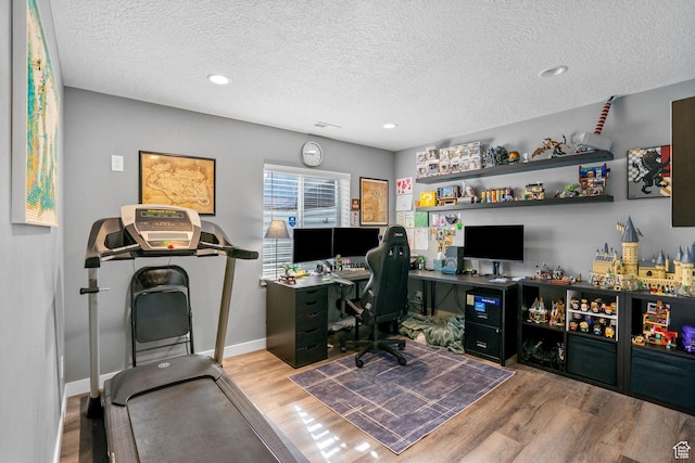 13137 S Acklins Dr, Herriman, UT 84096 - home office with recessed lighting, wood finished floors, a textured ceiling, and baseboards