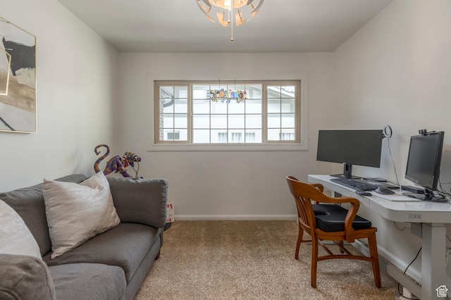 carpeted office with baseboards