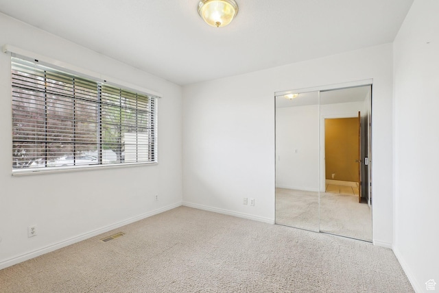 107 Country Club Dr, Stansbury Park, UT 84074 - carpeted spare room featuring baseboards and visible vents