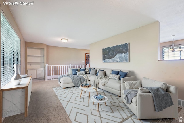 107 Country Club Dr, Stansbury Park, UT 84074 - carpeted living room with built in shelves