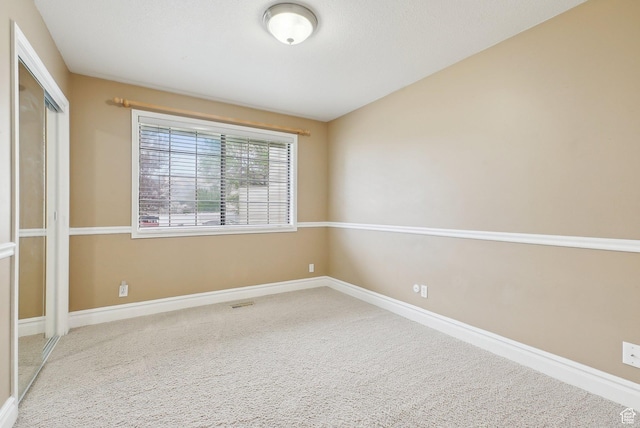 107 Country Club Dr, Stansbury Park, UT 84074 - empty room featuring carpet floors and baseboards