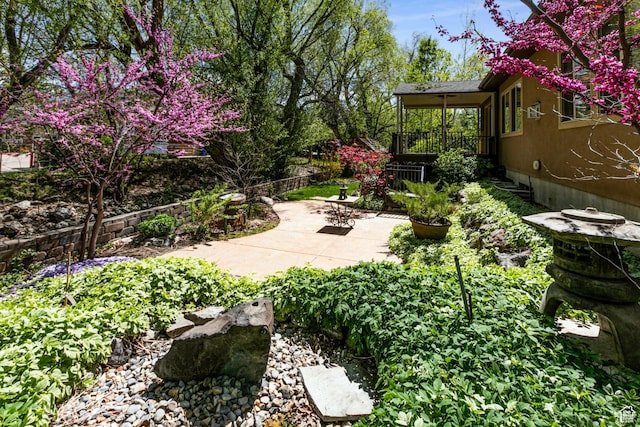6061 S Bridges Ln, Murray, UT 84121 - view of yard with a patio area