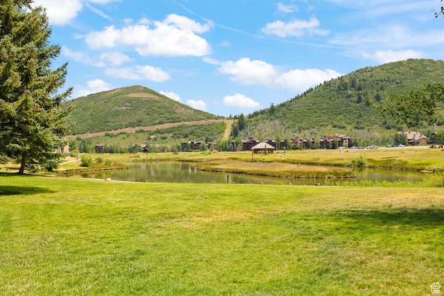 view of mountain feature with a water view