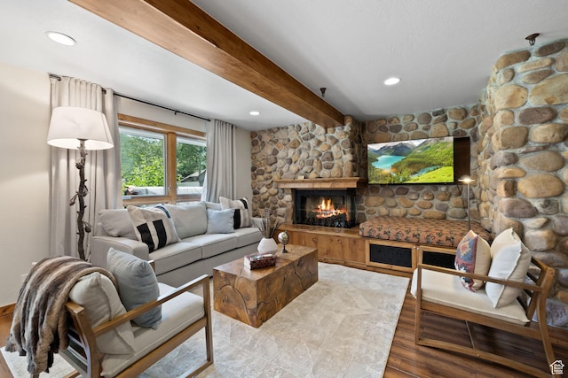 living area with a fireplace, wood finished floors, beam ceiling, and recessed lighting