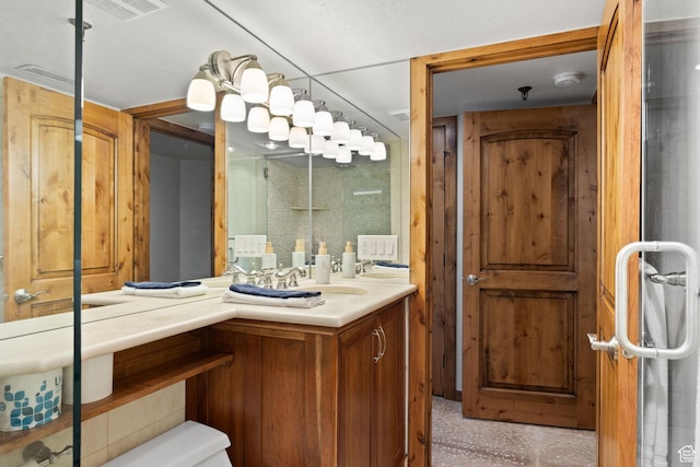 bathroom with vanity and visible vents