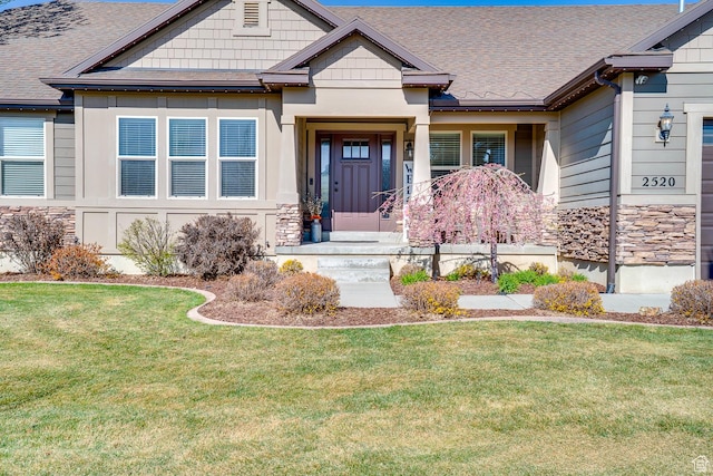2520 S 260 E, Heber City, UT 84032 - view of front facade with a front lawn, stone siding, and a shingled roof