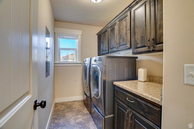 2520 S 260 E, Heber City, UT 84032 - washroom with baseboards, washer and dryer, a textured ceiling, and cabinet space
