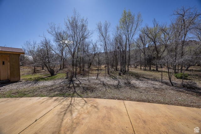 674 E Dragon Fly Trl, Moab, UT 84532 - exterior space with a patio area