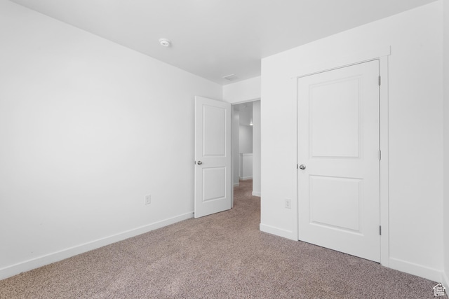580 Hal St, Stansbury Park, UT 84074 - unfurnished bedroom with baseboards and carpet floors