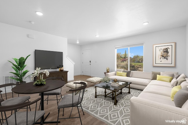 580 Hal St, Stansbury Park, UT 84074 - living room with recessed lighting, wood finished floors, and baseboards