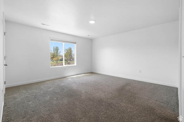 580 Hal St, Stansbury Park, UT 84074 - unfurnished room with carpet floors, visible vents, and baseboards