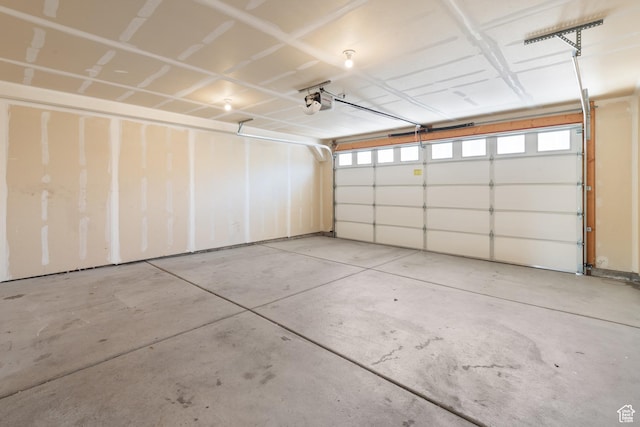 580 Hal St, Stansbury Park, UT 84074 - garage featuring a garage door opener