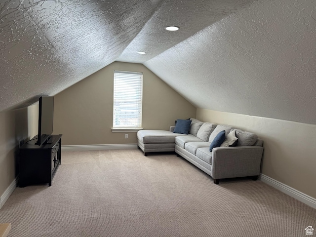 175 N 900 W, Roosevelt, UT 84066 - living room with lofted ceiling, light carpet, baseboards, and a textured ceiling
