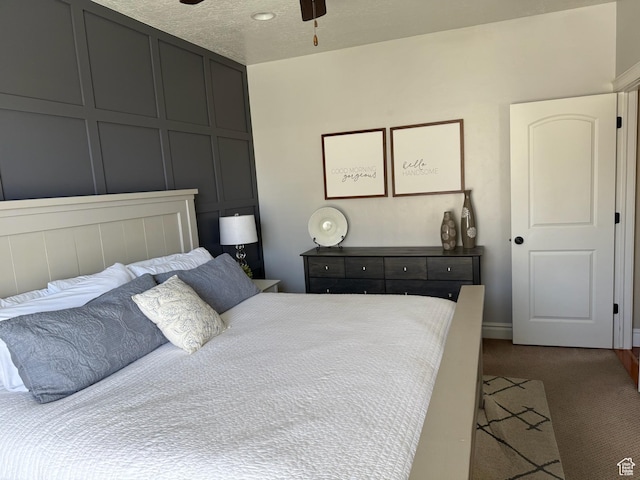 175 N 900 W, Roosevelt, UT 84066 - bedroom with baseboards, dark carpet, and ceiling fan