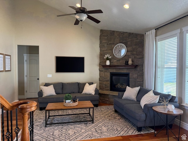 175 N 900 W, Roosevelt, UT 84066 - living area featuring lofted ceiling, wood finished floors, a ceiling fan, baseboards, and a fireplace