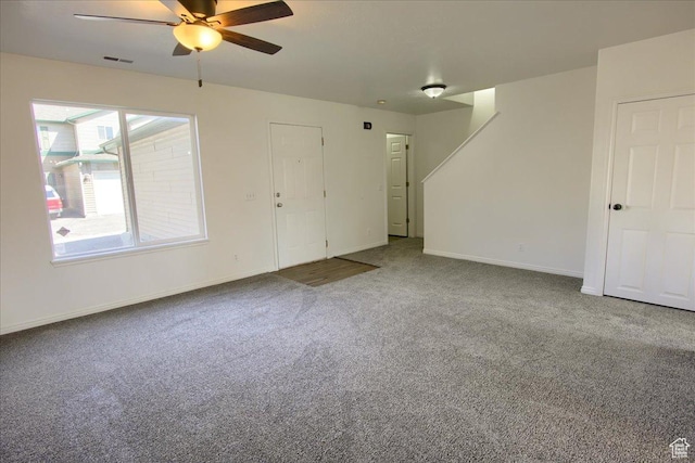 691 N Gramercy Ave, Ogden, UT 84404 - unfurnished living room featuring baseboards, visible vents, carpet, and ceiling fan