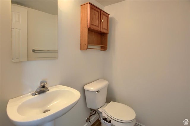 691 N Gramercy Ave, Ogden, UT 84404 - half bathroom with toilet and a sink