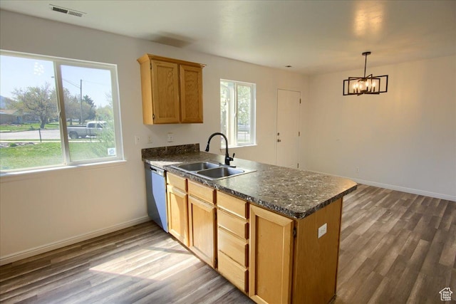 691 N Gramercy Ave, Ogden, UT 84404 - kitchen featuring dishwasher, visible vents, wood finished floors, a sink, and a peninsula
