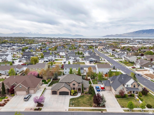bird's eye view featuring a mountain view and a residential view