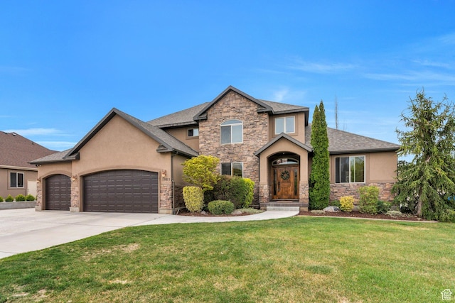 view of front of home with concrete driveway, an attached garage, stucco siding, stone siding, and a front yard