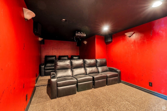 carpeted home theater featuring baseboards and recessed lighting