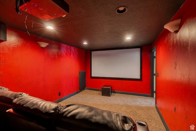 home theater with a textured ceiling, baseboards, carpet floors, and recessed lighting