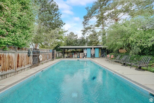 2779 S Connor St S, Millcreek, UT 84109 - community pool with a patio and fence