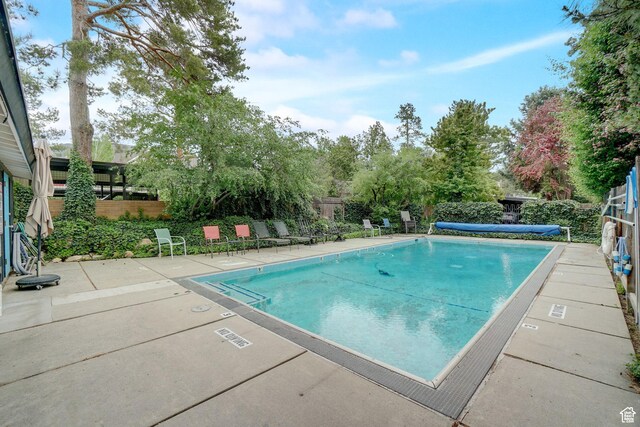 2779 S Connor St S, Millcreek, UT 84109 - community pool with a patio and fence