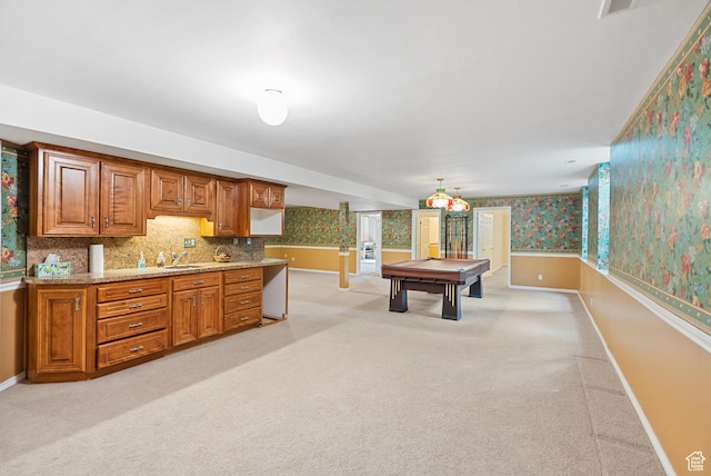 rec room with pool table, light carpet, a sink, and wallpapered walls