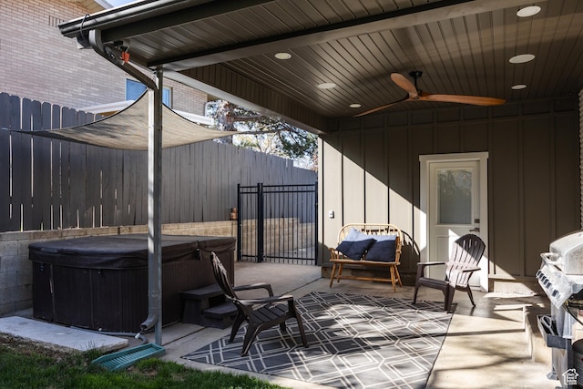 1045 E Claremont Dr S, Bountiful, UT 84010 - view of patio with fence, a hot tub, and a ceiling fan