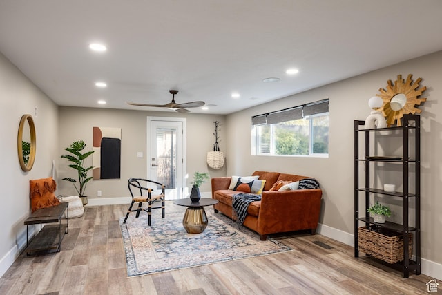 1045 E Claremont Dr S, Bountiful, UT 84010 - living room with recessed lighting, wood finished floors, visible vents, and baseboards