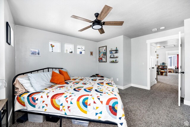 281 N 840 E, Hyrum, UT 84319 - carpeted bedroom featuring a ceiling fan and baseboards