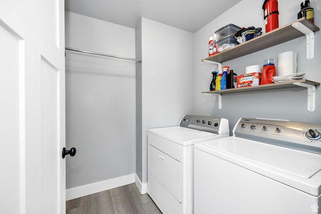 281 N 840 E, Hyrum, UT 84319 - washroom with baseboards, light wood-style floors, laundry area, and independent washer and dryer