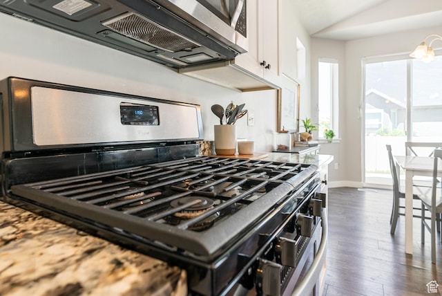 2212 W Autumn Dr S, Mapleton, UT 84664 - kitchen featuring appliances with stainless steel finishes, white cabinetry, dark wood-style floors, lofted ceiling, and baseboards