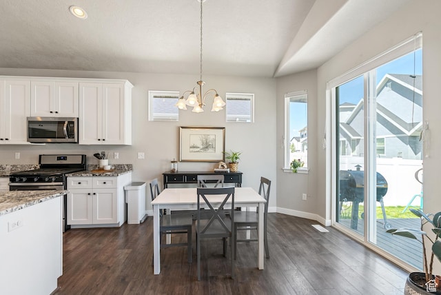 2212 W Autumn Dr S, Mapleton, UT 84664 - kitchen featuring stainless steel appliances, a chandelier, dark wood-style flooring, white cabinets, and baseboards