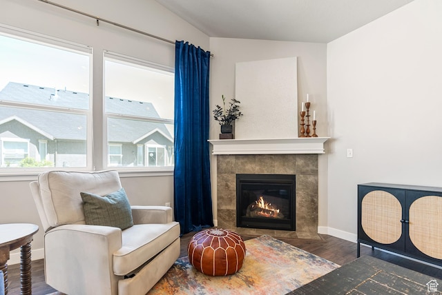2212 W Autumn Dr S, Mapleton, UT 84664 - sitting room featuring wood finished floors, a tile fireplace, and baseboards