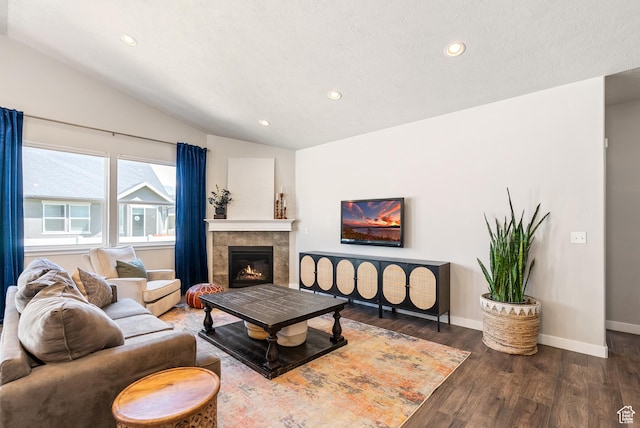 2212 W Autumn Dr S, Mapleton, UT 84664 - living room featuring vaulted ceiling, recessed lighting, wood finished floors, baseboards, and a tile fireplace