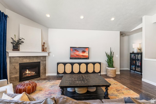 2212 W Autumn Dr S, Mapleton, UT 84664 - living room featuring wood finished floors, recessed lighting, baseboards, and a tiled fireplace