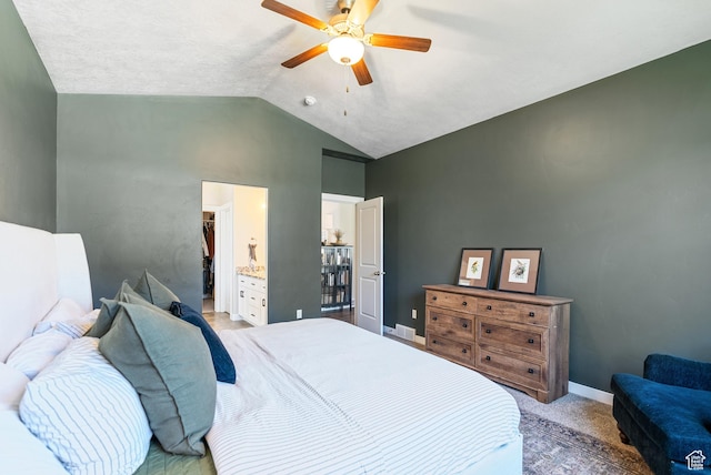 2212 W Autumn Dr S, Mapleton, UT 84664 - bedroom with vaulted ceiling, light colored carpet, baseboards, a ceiling fan, and ensuite bathroom