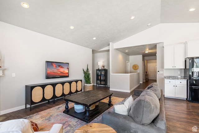 2212 W Autumn Dr S, Mapleton, UT 84664 - living room with vaulted ceiling, dark wood-type flooring, baseboards, and recessed lighting